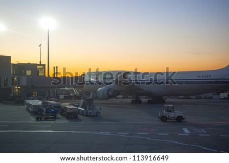 FRANKFURT, GERMANY - SEPTEMBER 20: Air China Flight at the gate for morning flight on September 20, 2012 in Frankfurt, Germany. New Terminal A is under construction for airport enlargement.