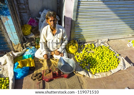 NEW DELHI - OCTOBER 16: Typical vegetable street market in India on October 16, 2012 in New Delhi, India. Food hawkers in India are generally unaware of standards of hygiene and cleanliness.