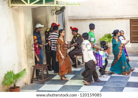 UDAIPUR, INDIA- OCTOBER 21: security check at the palace of Udaipur on October 21, 2012 in Udaipur, India. Every Palace in Rajasthan is checked by police at the entrance since 2005.