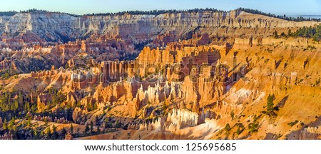 beautiful landscape in Bryce Canyon with magnificent Stone formation like Amphitheater, temples, figures in Morning light