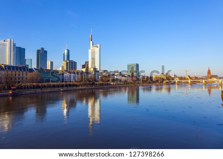 FRANKFURT, GERMANY - FEB 5: view to skyline of Frankfurt with river Main and skyscraper on Feb 5, 2012 in Frankfurt,Germany. It is the fifth-largest city in Germany, with a 2012 population of 704,449.