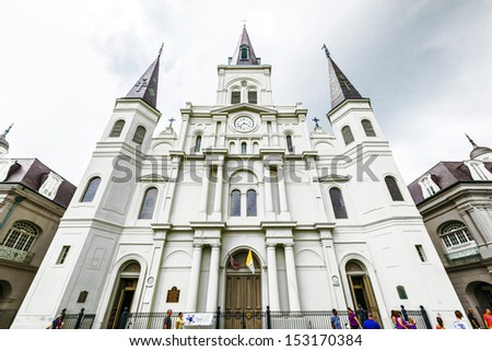 NEW ORLEANS, USA - JULY 15: famous St. Louis Cathedral at Jackson Square, in the  French Quarter on July 15, 2013 in New Orleans, USA. Three Roman Catholic churches have stood on the site since 1718.