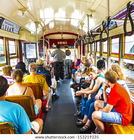 NEW ORLEANS - JULY 15: people travel with the famous old Street car St. Charles line on July 15, 2013 in New Orleans, USA.  It is the oldest continually operating street car line in the world.
