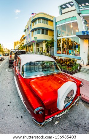 Miami, Usa - July 31: Classic Ford Car Parks In The Art Deco District On July 31, 2013 In Miami Beach, Florida. Art Deco Life In South Beach Is One Of The Main Tourist Attractions In Miami.