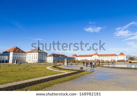 MUNICH, GERMANY - DEC 28: Unidentified people at Nymphenburg Palace, the summer residence of the Bavarian kings, in Munich, Germany on DEC 28, 2013. This palace welcomes 300,000 visitors per year.