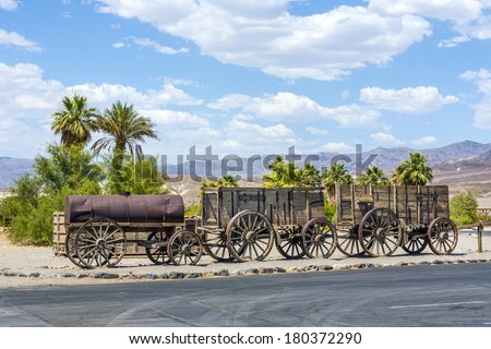 old waggon at the entrance of the Furnance Creek Ranch in the middle of Death Valley, with these wagons the first men crossed the death valley in the 19th century