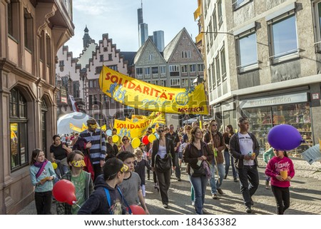 FRANKFURT, GERMANY - MARCH 29:  catholic hildren with parents at their first communion call for solidarity with all children in the world for Misereor on March 29, 2014 in Frankfurt, Germany.