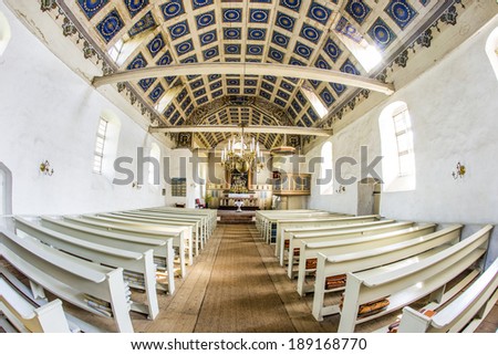 BENZ, GERMANY - APRIL 18: famous small village church on April 18, 2014 in Benz, Germany. The church was a favourite painting subject for Lionel Feininger. Paintings hanging in the MoMa.