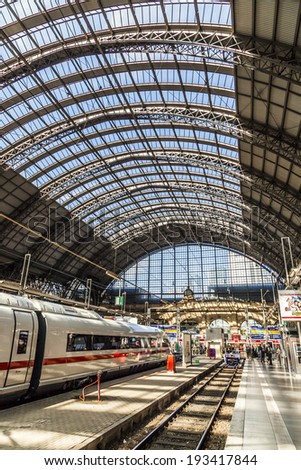 FRANKFURT, GERMANY - MAY 16, 2014: Inside the Frankfurt central station in Frankfurt, Germany. With about 350.000 passengers per day its the most frequented railway station in Germany.