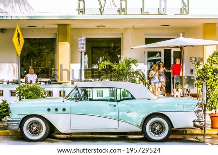 MIAMI, USA JULY 31, 2010: classic car with chrome radiator grill parked in front of the restaurant in Hotel Avalon in Miami, USA.
