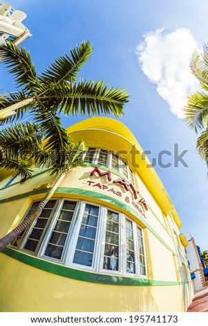 MIAMI, USA - JULY 31, 2010: facade of art deco building at Ocean drive with Maya Grill restaurantin Miami, USA. Art Deco architecture in South Beach is one of the main tourist attractions.