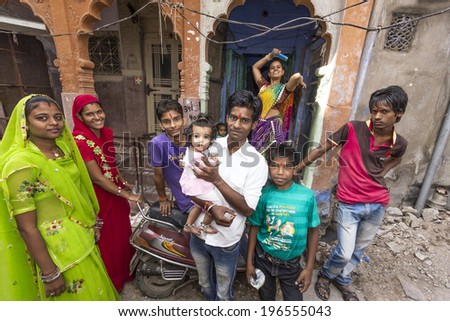 JODPUR, INDIA - OCTOBER 23, 2012: indian family poses proudly in Jodhpur, India. Jodhpur is the second largest city in the Indian state of Rajasthan with over 1 million habitants.