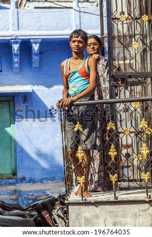 JODPUR, INDIA - OCTOBER 23, 2012: Unidentified Indian family poses at the balcony in Jodhpur, India. Jodhpur is the second largest city in the Indian state of Rajasthan with over 1 million habitants.