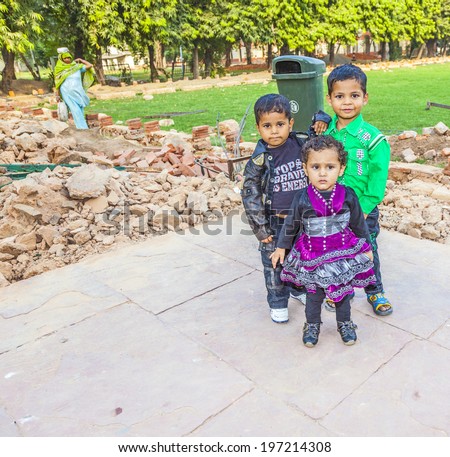 DELHI, INDIA - NOV 9, 2011: group of indian children pose in Delhi, India. Average about 1 child or two children is the norm in most Indian Hindu families. The fertility rate for Indian women is 2.7.