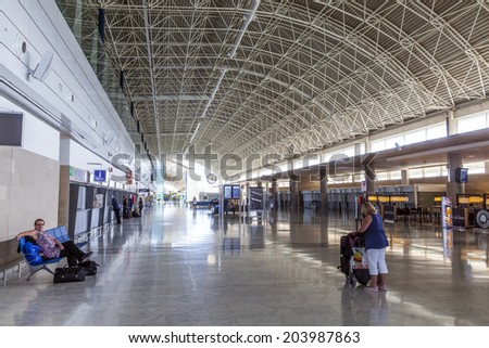 EL MATORRAL, SPAIN - MARCH 28, 2013: arrival hall at  Airport of Fuenteventurain El Matorral, Spain. The airport was opened on Sep 1969 and has the capability to handle 5 Mio passengers per year.