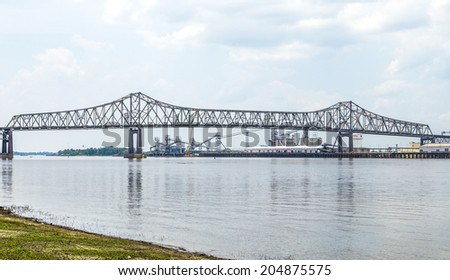 BATON ROUGE - JULY 13, 2013: Mississippi River Bridge in Baton Rouge, USA. The Horace Wilkinson Bridge is a cantilever bridge carrying Interstate 10 in Louisiana across the Mississippi River.