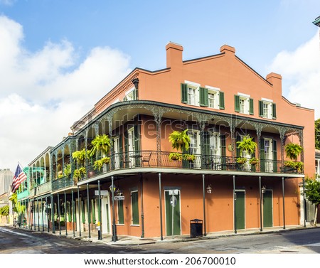 NEW ORLEANS, USA - JULY 17, 2013: houses in historic building in the French Quarter in New Orleans, USA. Tourism provides a large source of revenue after the 2005 devastation of Hurricane Katrina.
