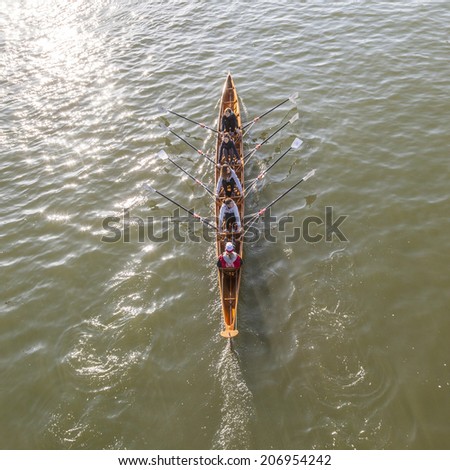 FRANKFURT, GERMANY - MARCH 2, 2013: boat coxed four team trains at river main in Frankfurt, Germany. They train for the Ruderverein Frankfurt, the famous old sports club from 1869 at river Main.