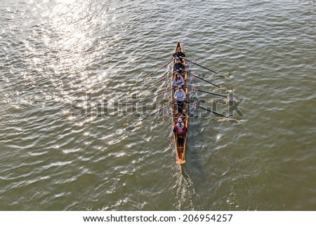 FRANKFURT, GERMANY - MARCH 2, 2013: boat coxed four team trains at river main in Frankfurt, Germany. They train for the Ruderverein Frankfurt, the famous old sports club from 1869 at river Main.