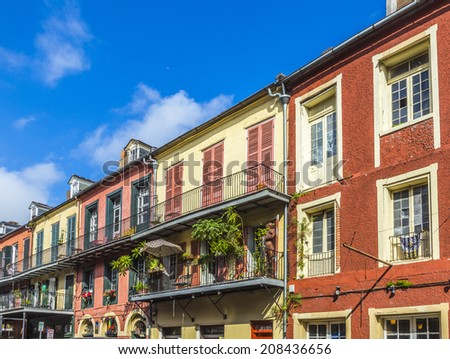 NEW ORLEANS, LOUISIANA USA - JULY 17, 2013: historic building in the French Quarter in New Orleans, USA. Tourism provides a large source of revenue after the 2005 devastation of Hurricane Katrina.