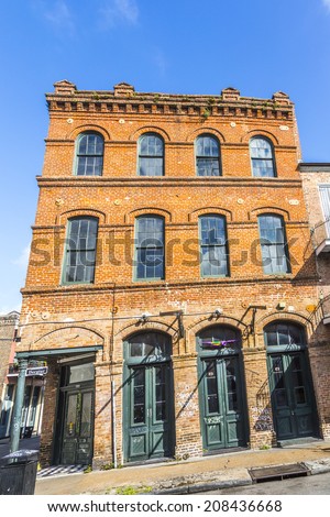 NEW ORLEANS, LOUISIANA USA - JULY 17, 2013:  historic building in the French Quarter in New Orleans, USA. Tourism provides a large source of revenue after the 2005 devastation of Hurricane Katrina.