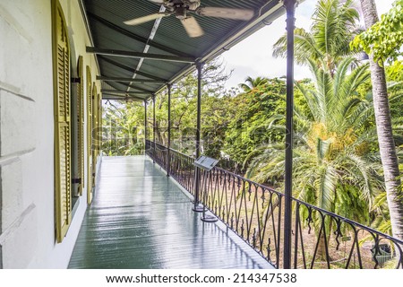 KEY WEST, USA - AUG 27, 2014: porch on the side of  Ernest Hemmingways house in Key West, USA. Ernest Hemingway lived and wrote here from 1931 to 1939.