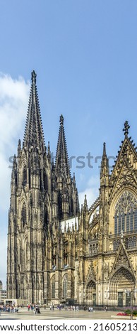 COLOGNE, GERMANY- SEP 7, 2014: Tourists and residents in front of the Cologne Cathedral in Cologne, Germany. It is Germanys most visited landmark visited by 20.000 people a day.