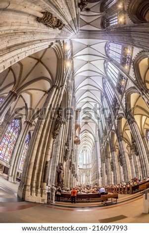 COLOGNE, GERMANY- SEPTEMBER 7, 2014: church service held in the cathedral in Cologne, Germany. The dome is Germanys most visited landmark visited by 20.000 people a day.