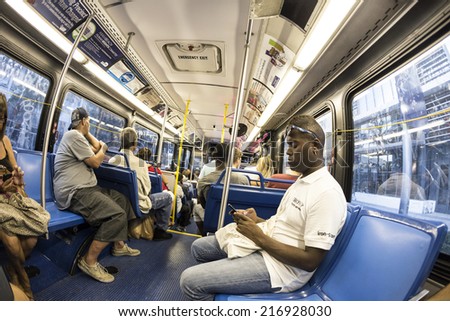 MIAMI, USA - AUG 18, 2014: people in the downtown Metro bus in M