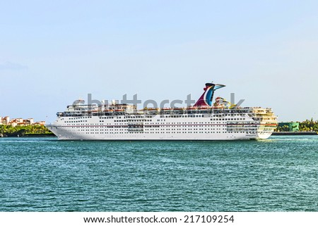 MIAMI, USA - AUGUST 18, 2014: Carnival Cruise Line, cruise ship Carnival Ectasy  Sails from Miami, USA to a cruise in the Carribean.