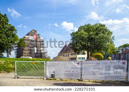 LORSCH, GERMANY - JULY 2, 2013: World culture heritage monastery Lorsch under construction in Lorsch, Germany. The Gate is renovated by the government of Hesse.