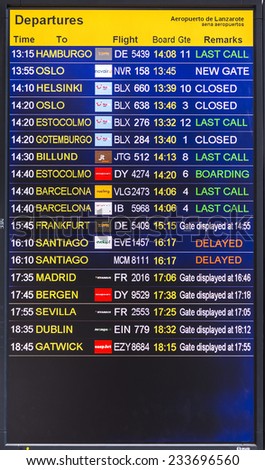 ARRECIFE, SPAIN - NOV 21, 2014: flight information display screen board at airport of Arrecife, Spain.  In 1999 a new passenger terminal opened with a capacity of 6 million passengers per annum.