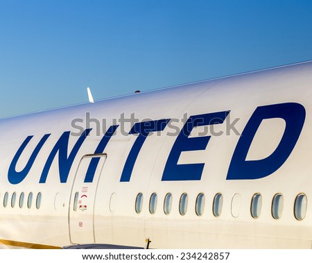 FRANKFURT, GERMANY - JULY 17, 2014: United Airlines aircraft logo at an aircraft in Frankfurt. United Airlines is headquartered in Chicago, Illinois.