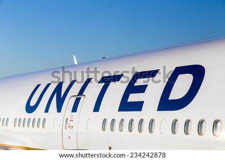 FRANKFURT, GERMANY - JULY 17, 2014: United Airlines aircraft logo at an aircraft in Frankfurt. United Airlines is headquartered in Chicago, Illinois.