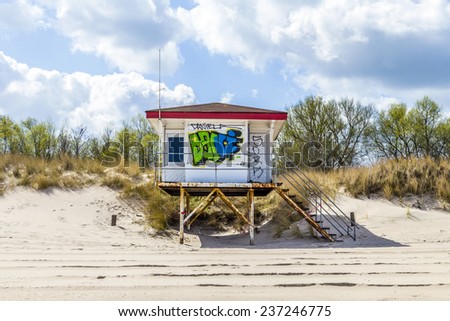 KOSEROW, USEDOM - APR 13, 2014: beach hut with Grafity in Koserow, Usedom. The tourist season starts end of April and the beach huts are cleaned of grafitys before season starts.