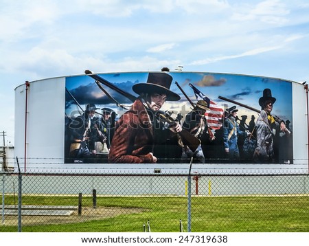 LA PORTE, USA - JULY 11: oil paintings on the tanks on July 11, 2013 in La Porte, USA. In Lynchburg near the San Jacinto Monument oil tanks are painted with historic texas history scenes.