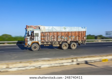 JEWAR BANGER, INDIA - NOV 12, 2011: truck uses the YAmuna express way in Jewar Banger, India. The Highway is a toll road and was finally inaugurated at August 2012.