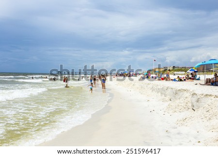 NICEVILLE, USA - JULY 21, 2013: people enjoy the beautiful beach at Niceville, USA. The adjacent cities of Niceville and Valparaiso, both built around Boggy Bayou, are known as the Twin Cities.
