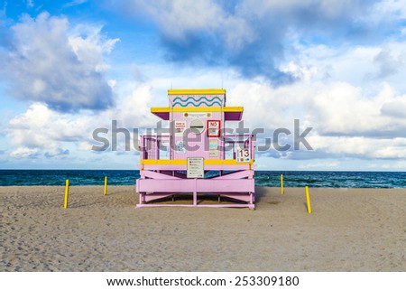 MIAMI, USA - AUG 01, 2013: life guard tower on South Beach in sunset in Miami, USA. The 27 colorful life guard towers are a main attraction at south beach and famous for their colorful art deco style.