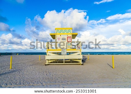 MIAMI, USA - AUG 01, 2013: life guard tower on South Beach in sunset in Miami, USA. The 27 colorful life guard towers are a main attraction at south beach and famous for their colorful art deco style.