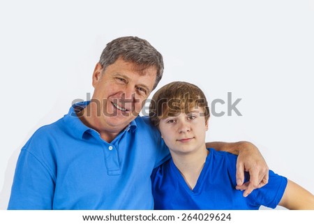 happy father with his sun in blue shirt