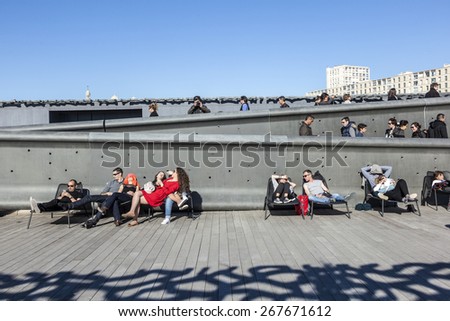 MARSEILLE, FRANCE - APR 5, 2015 : people relax at Museum of European and Mediterranean Civilizations. MuCEM was inaugurated inJun 2013 when Marseille was designated as the European Capital of Culture.