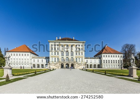 MUNICH, GERMANY - APR 20, 2015: people at Nymphenburg Palace, the summer residence of the Bavarian kings, in Munich, Germany. This palace welcomes 300,000 visitors per year.