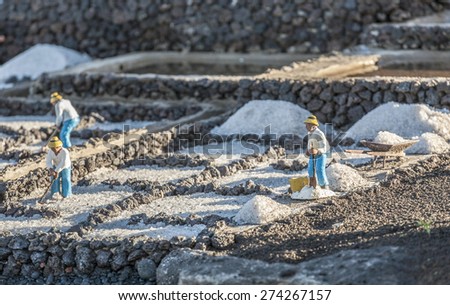 christmas crip at the public place in Yaiza, Spain. The scene shows worker in the saline de Janubio in Lanzarote integrated in christian native scene.
