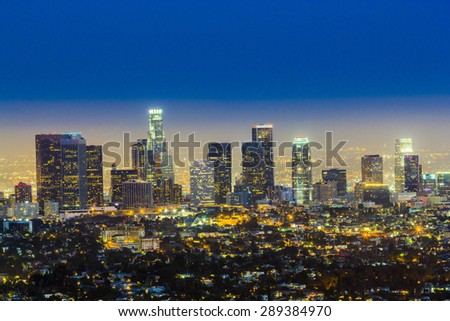 skyline of Los Angeles by night with blue dark sky