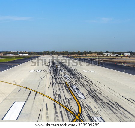 NEW YORK, USA - OCT 20, 2015: empty runway at the John F. Kennedy airport in New York. The airport was renamed in 1963 to president John F. Kennedy.