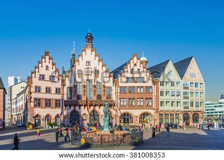 FRANKFURT, GERMANY - MAR 6, 2015: People on Roemerberg square in Frankfurt, Germany. Frankfurt is the fifth-largest city in Germany.