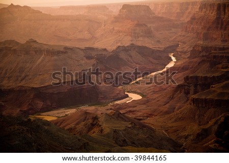 sunset at the grand canyon seen from Desert View Point, south rim, river Colorado flows  in the canyon