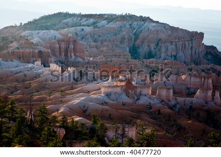 beautiful landscape in Bryce Canyon with magnificent Stone formation like Amphitheater, temples, figures in Morning light