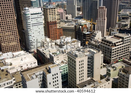 Skyline of San Francisco seen from a sky scraper with blue sky